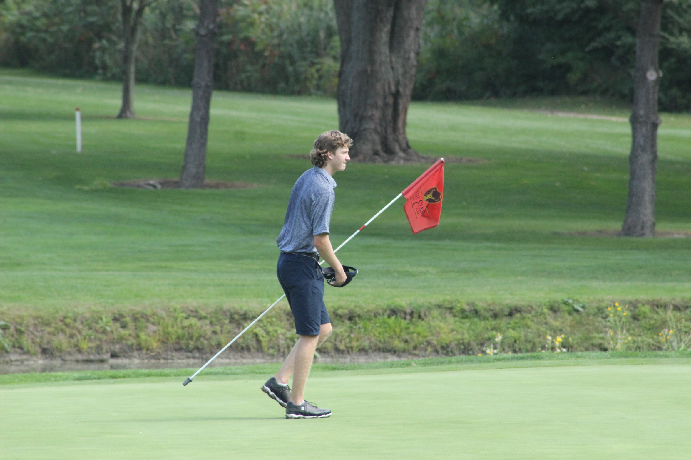L. Palmateer on golf course