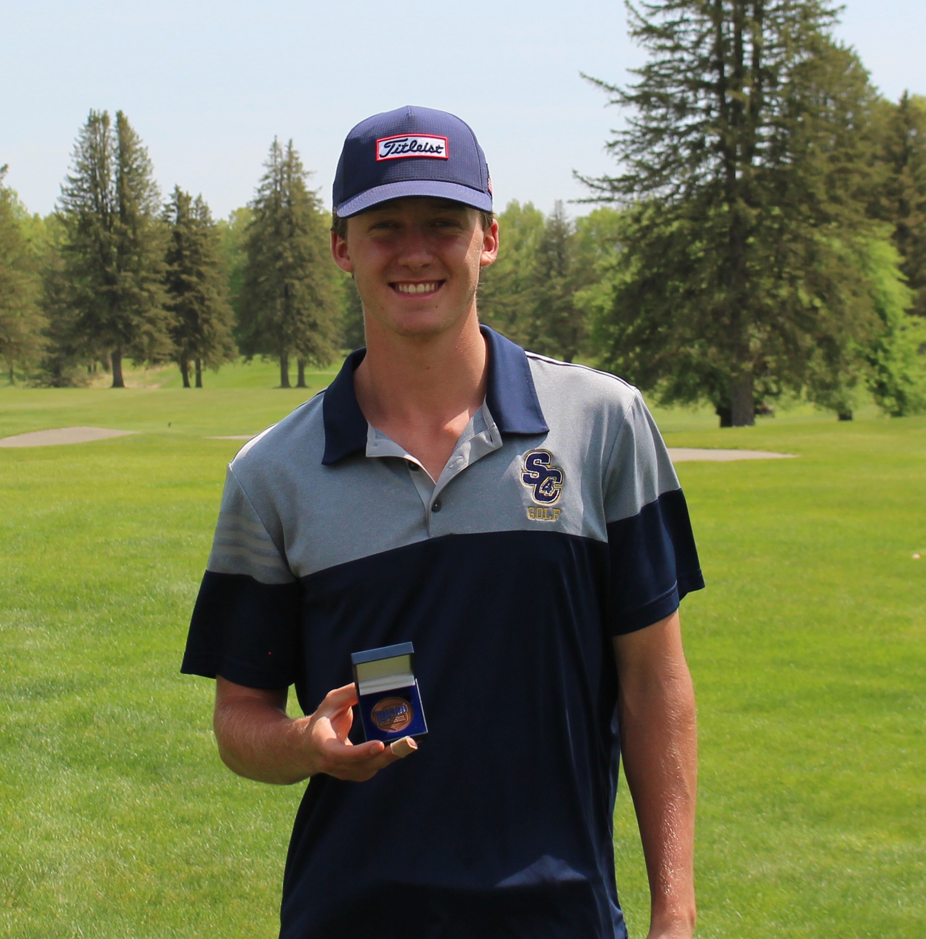 Logan Palmateer with his Region 12 Championship second place medal