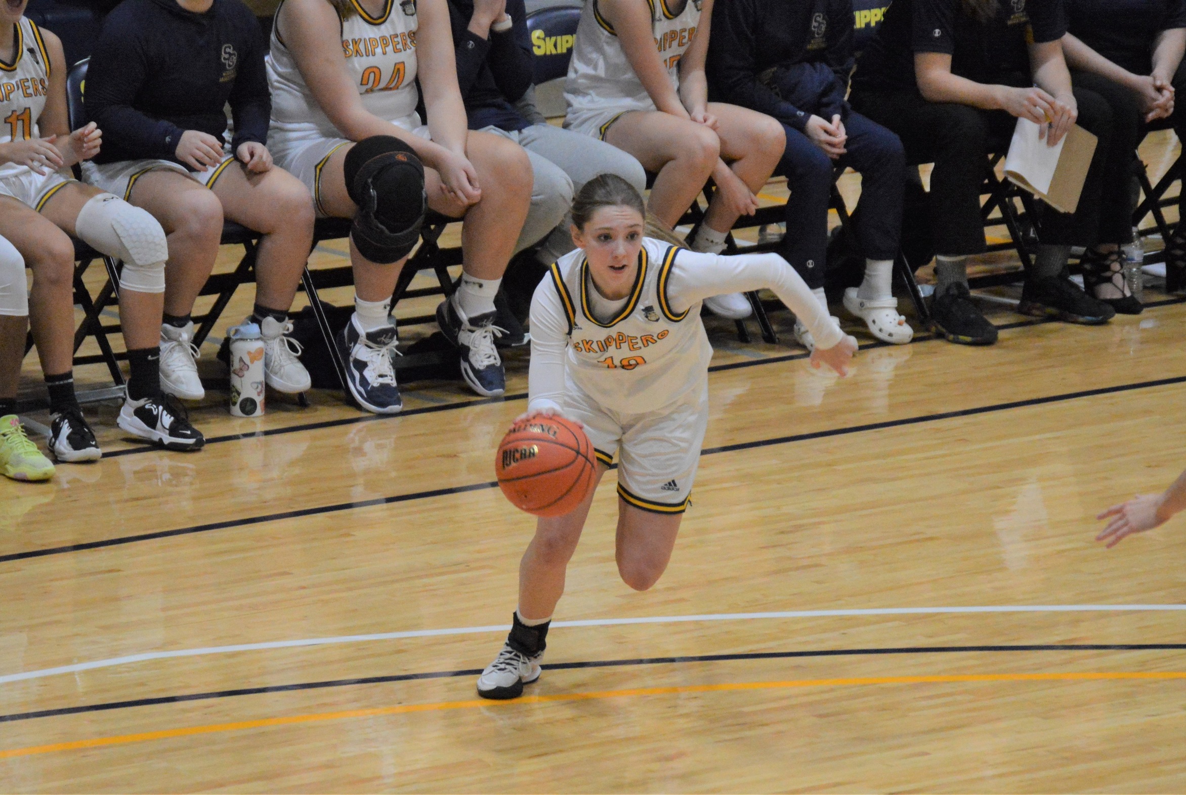 #10 Taylor Carrow drives to the basket in a contest at the SC4 Fieldhouse. 