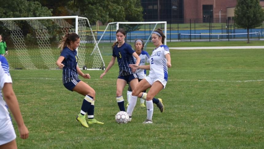 SC4 women's soccer players #3 and #8