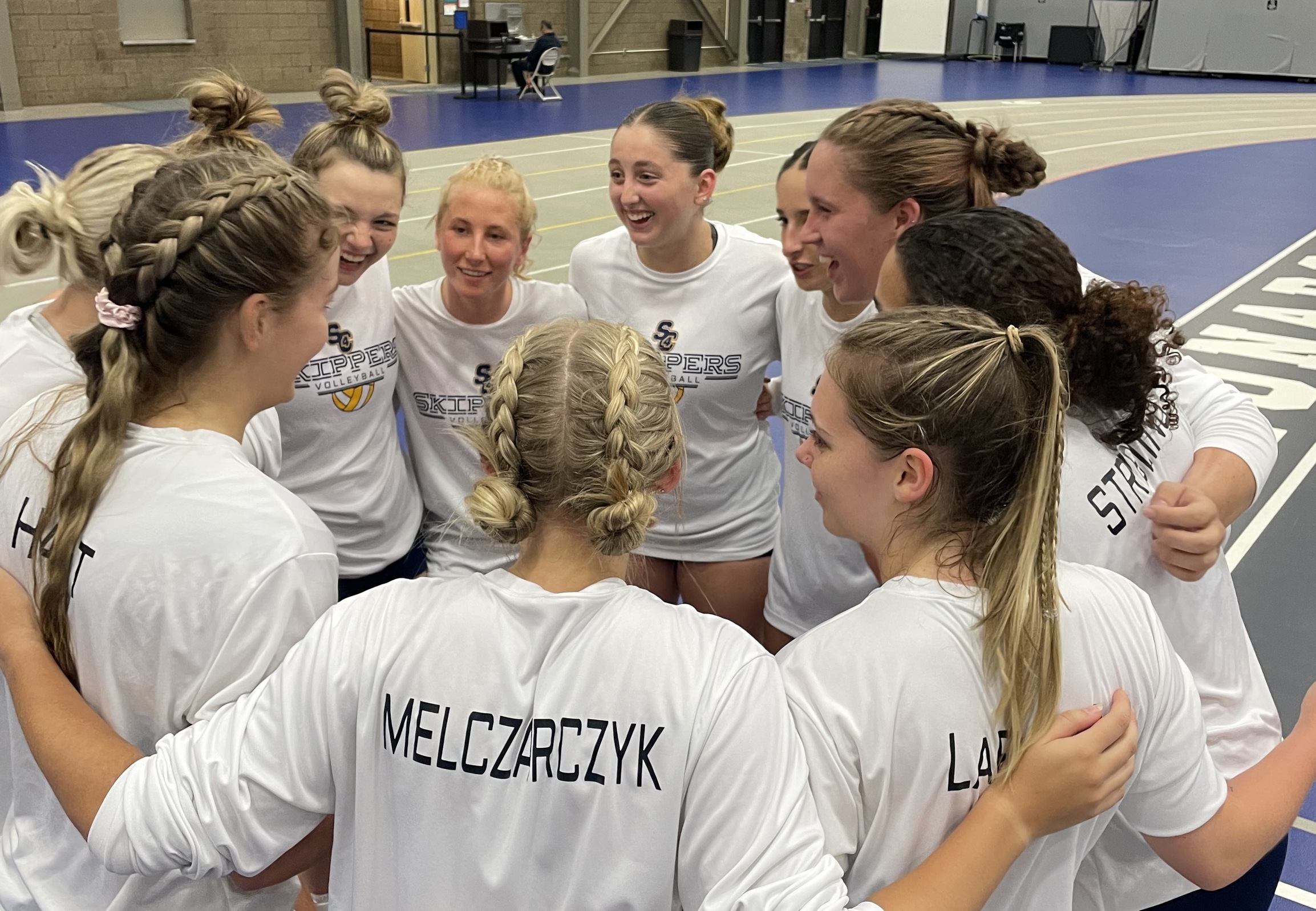 2023-2024 volleyball team before their game against macomb