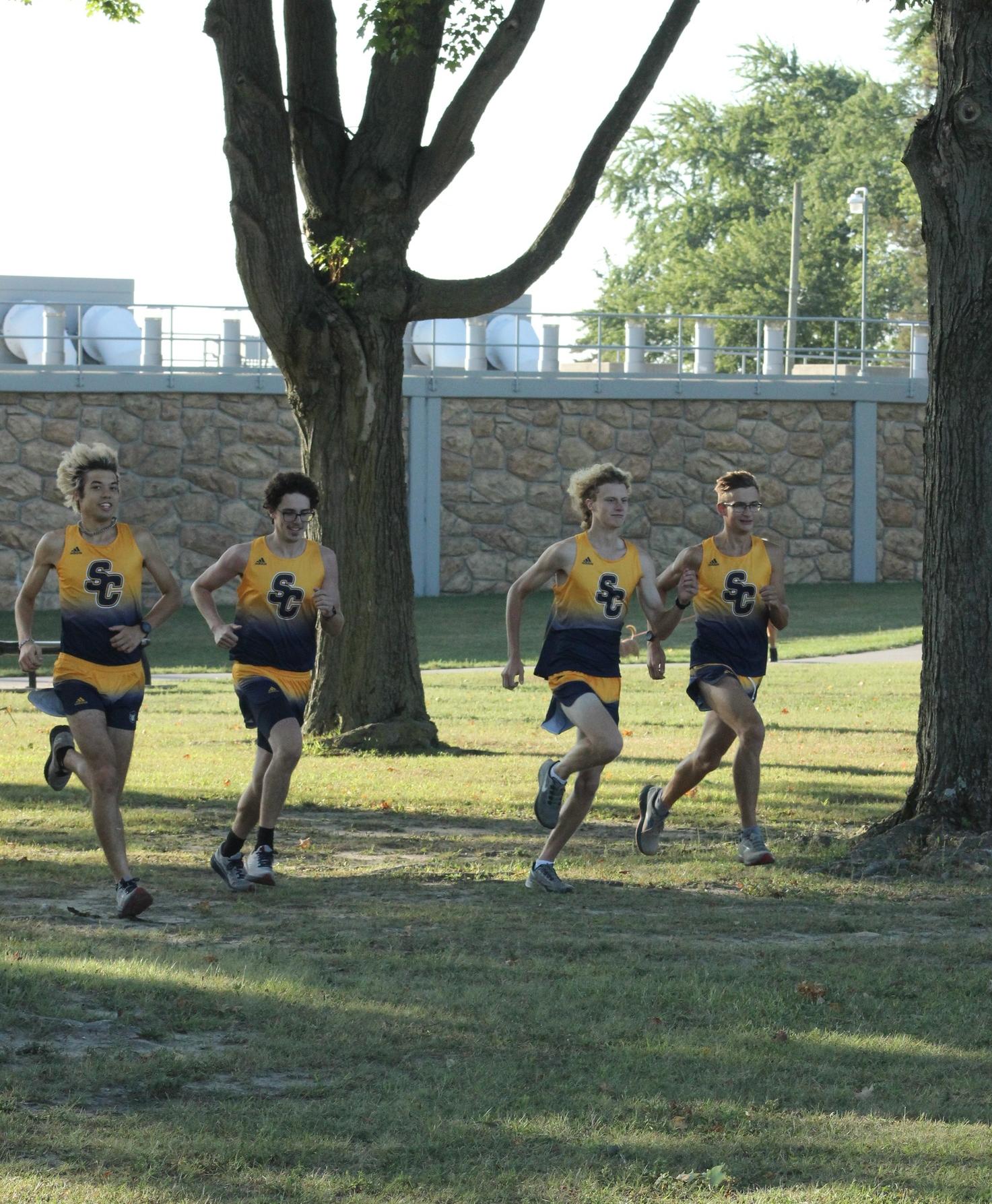 4 sc4 skipper cross country runners running together 