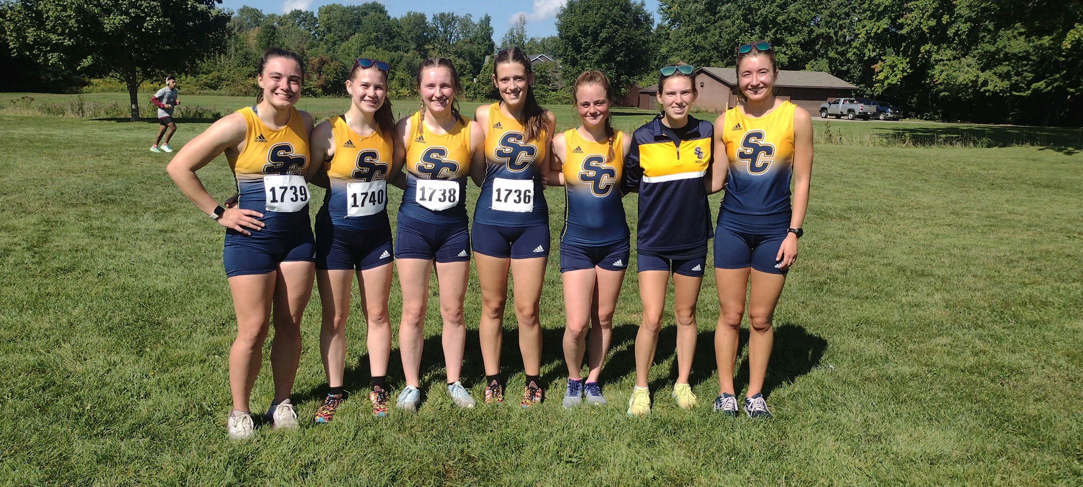 2023 women's cross country team photo before their race at GRCC